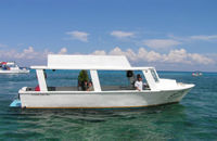Glass Bottom Boat departing Cozumel