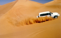 4x4 Abu Dhabi Desert Safari with Camel Ride, Dinner and Belly Dancing Performance